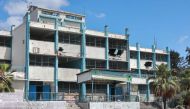 This picture taken on May 7, 2024 shows a view of the damaged building of a preparatory school for boys run by the UNRWA at the Shati camp for Palestinian refugees, west of Gaza City. (Photo by AFP)