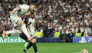 Real Madrid's Spanish forward #14 Joselu scores the equalizing goal during the UEFA Champions League semi final second leg football match between Real Madrid CF and FC Bayern Munich at the Santiago Bernabeu stadium in Madrid on May 8, 2024. (Photo by Pierre-Philippe MARCOU / AFP)
