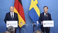 German Chancellor Olaf Scholz (L) and Sweden's Prime Minister Ulf Kristersson hold a news conference at the Norrsken Foundation innovation centre in Stockholm, Sweden, on May 14, 2024. (Photo by Samuel STEEN / TT NEWS AGENCY / AFP)