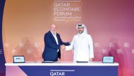 Sheikh Mohammed H F Al Thani, CEO of Qatar Free Zones Authority, and Patrick Moebel, President and CEO of FedEx Logistics, during the signing ceremony.
