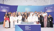 Officials posing for a group picture during the fourth edition of Qatar Economic Forum.