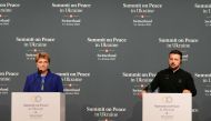 Ukrainian President Volodymyr Zelensky (R) and Swiss Federal President Viola Amherd give a press conference during a Summit on Peace in Ukraine at the luxury Burgenstock resort, near Lucerne in central Switzerland, on June 15, 2024. (Photo by Dimitar Dilkoff / AFP)