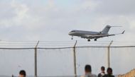 The plane carrying WikiLeaks founder Julian Assange lands at Saipan International Airport after a stopover in Bangkok in Saipan, Northern Mariana Islands, on June 26, 2024, after reaching a plea deal with US authorities. (Photo by Yuichi Yamazaki / AFP)