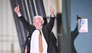 WikiLeaks founder Julian Assange gives thumbs up after arriving at Canberra Airport in Canberra on June 26, 2024, after he pleaded guilty at a US court in Saipan to a single count of conspiracy to obtain and disseminate US national defence information. (Photo by William West / AFP)