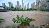 Changsha: This photo shows the rising water level of a river in Changsha, central China's Hunan Province, June 24, 2024. On Monday, Changsha of central China's Hunan Province saw 15 waterlogged roads after intense rain. The city has launched a Level III emergency response for Floods. (Xinhua/Chen Zeguo)