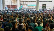 Students protest to demand merit-based system for civil service jobs in Dhaka on July 11, 2024. (Photo by MUNIR UZ ZAMAN / AFP)
