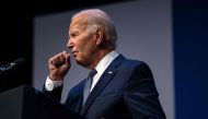 This photo taken on July 16, 2024 shows US President Joe Biden clearing his throat as he speaks on economics during the Vote To Live Properity Summit at the College of Southern Nevada in Las Vegas, Nevada. (Photo by Kent Nishimura / AFP)