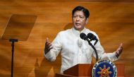 Philippine President Ferdinand Marcos delivers the annual State of the Nation Address at the House of Representatives in Manila on July 22, 2024. (Photo by JAM STA ROSA / AFP)