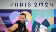 US basketball player Stephen Curry leaves after a press conference in Paris on July 25, 2024, ahead of the Paris 2024 Olympic Games. (Photo by Fabrice Coffrini / AFP)
 