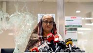 In this handout photograph taken and released on July 25, 2024 by Bangladesh Prime Minister's Office, Prime Minister Sheikh Hasina addresses the media at a vandalized metro station in Mirpur, after the anti-quota protests. (Photo by Bangladesh Prime Minister's Office / AFP)
