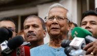 Bangladeshi Nobel peace laureate Muhammad Yunus addressing the media as he prepared to leave after filing an appeal for the extension of his bail at Labour Appellate Tribunal in Dhaka on March 3, 2024. Photo by REHMAN ASAD / AFP.