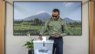 Incumbent President of Rwanda and Rwandan Patriotic Front (RPF) presidential candidate Paul Kagame casts his ballot at the SOS Kinyinya polling station in in Kigali, on July 15, 2024. (Photo by Luis Tato / AFP)