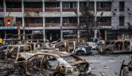 Police vehicles that were burned during anti-government demonstrations are seen inside the compound of a police station as students volunteering to maintain law and order are in control of the Jatrabari Police Station in Dhaka on August 11, 2024. Nobel laureate Muhammad Yunus and his newly named interim government set out on August 9 to restore 