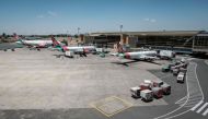 Aircrafts belonging to Kenya Airways are statione at the departure terminal during a strike by the airline workers at the Jomo Kenyatta International Airport in Nairobi on March 6, 2019. AFP / Yasuyoshi CHIBA

