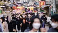 File photo of people walking the streets of Seoul. 