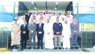 Participants in a group photo during the event in Doha.