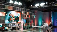 A contestant presents her concept to the jury during the casting of Stars of Science season 16.
