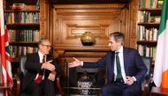 Ireland's Prime Minister Simon Harris (R) and Britain's Prime Minister Keir Starmer shake hands as they pose for a photograph inside Farmleigh House in Dublin on September 7, 2024, during their meeting. (Photo by Peter Morrison / POOL / AFP)
