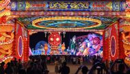 People visit the Garden Expo Park during a lantern show as part of celebrations marking the Mid-Autumn Festival in Beijing on September 14, 2024. (Photo by ADEK BERRY / AFP)
