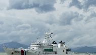 This handout photo from the Philippine Coast Guard taken and received on September 15, 2024 shows the Philippine Coast Guard ship BRP Teresa Magbanua as it arrives at a port in Puerto Princesa, Palawan. (Photo by Handout / Philippine Coast Guard (PCG) / AFP)

