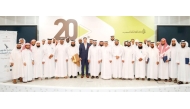 Undersecretary of the Ministry of Awqaf and Islamic Affairs, Dr. Sheikh Khalid bin Mohammed bin Ghanem Al Thani with honourees during a ceremony.