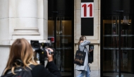 A pedestrian walks past the Paris offices of the Netflix streaming company at Square Edouard VII in Paris on November 5, 2024. Photo by Ian LANGSDON / AFP.