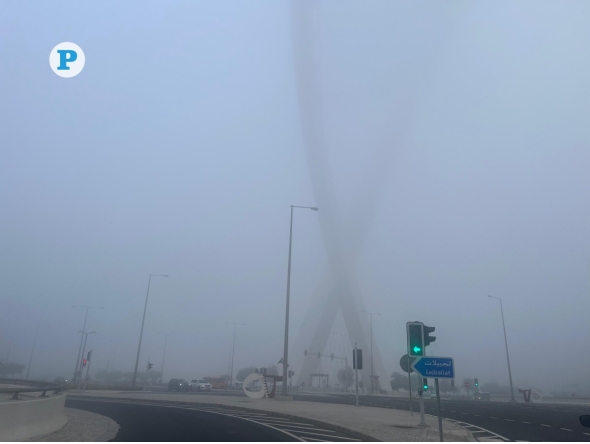 File photo showing low visibility near Al Wahda Arches in Onaiza. Photo by Mahmoud Elmazaty / The Peninsula