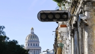 A blacked out traffic light is pictured after a power outage in Havana on December 4, 2024. (Photo by Yamil Lage / AFP)