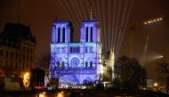 This photograph shows video mapping on the facade of Notre-Dame de Paris cathedral a few days before its reopening after reconstruction following the fire on April 4, 2019 when it was devastated, in Paris on December 5, 2024. Photo by Ludovic MARIN / AFP