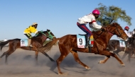Jockeys take part in the first horse race of the season at the Biligoni racecourse in Chad on November 30, 2024. (Photo by Joris Bolomey / AFP)