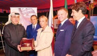 President of Italian Chamber of Commerce in Qatar Palma Libotte presenting the award to President and CEO of Alfardan Group, Omar bin Hussain Alfardan. Italy’s Minister of Agriculture, Food Sovereignty and Forestry H E Francesco Lollobrigida (second right) and Ambassador of Italy to Qatar H E Paolo Toschi (first right) are also seen. 