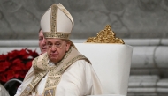 Pope Francis presides over the Christmas Eve mass at St Peter's Basilica in the Vatican on December 24, 2024. Photo by Tiziana FABI / AFP.
