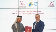 Director-General of QNA H E Ahmed bin Saeed Al Rumaihi and Chairman of CNA H E Andreas Frangos during the signing of the agreement.