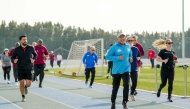 UDST President Dr. Salem Al Naemi and others in action to mark the National Sport Day yesterday. 