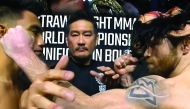 ONE Championship Chairman and CEO Chatri Sityodtong (centre) with Joshua Pacio (left) and Jarred Brooks after the ceremonial weigh-ins.

