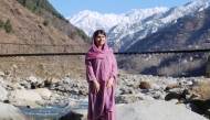 This handout picture taken and released by the Malala Fund on March 5, 2025, shows Nobel Peace Prize laureate and education activist Malala Yousafzai posing during a visit to her home village in Shangla.  (Photo by Handout / Malala Fund / AFP)