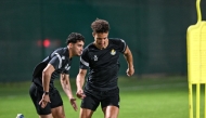 Al Gharafa players during a training session.