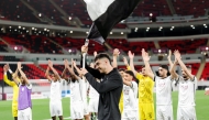Al Sadd players celebrate after winning a match in this file photo.