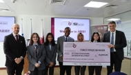 The first prize winning team with their cheque.
