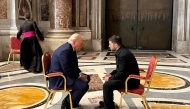 In this handout photograph taken and released by the Ukrainian Presidential Press Service in Kyiv on April 26, 2025, Ukraine's President Volodymyr Zelensky (R) meets with US President Donald Trump (L) on the sidelines of Pope Francis's funeral at St. Peter's Basilica at the Vatican. (Photo by Handout / UKRAINIAN PRESIDENTIAL PRESS SERVICE / AFP) 