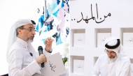 Former Minister of Sports and Youth H E Salah bin Ghanim Al Ali signing a copy of his book.