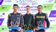 Aleksei Guzov (centre) poses with the trophy along with the podium winners of the opening round.
