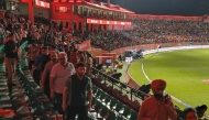 Photo used for representational purposes. Spectators leave after the Indian Premier League (IPL) Twenty20 cricket match between Punjab Kings and Delhi Capitals was abandoned due to a significant technical failure at the Himachal Pradesh Cricket Association Stadium in Dharamsala on May 8, 2025. (Photo by Shammi MEHRA / AFP) 