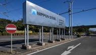 File: An entrance sign for Japanese company Nippon Steel's East Nippon Works Kashima Area facility is pictured in Kashima, Ibaraki prefecture, north of Tokyo on December 6, 2024. (Photo by Richard A Brooks / AFP)