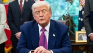 US President Donald Trump speaks while signing an executive order on legislation relating to household consumer energy policies, in the Oval Office of the White House in Washington, DC, on May 9, 2025. (Photo by Saul Loeb / AFP)