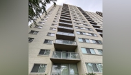 A child fell from a 15th-floor balcony of this apartment building in Montgomery County, Maryland, and landed on a bush and survived, police said. Picture: Dan Morse/The Washington Post