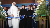 Minister of Social Development and Family H E Buthaina bint Ali Al Jabr Al Nuaimi, UDC CEO Yasser Salah Al-Jaidah and the Founder of Autism Parents Platform Hamda Al-Hitmi, along with other officials at the launch ceremony.