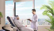 A doctor attending a patient.
