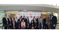 Participants with officials at the workshop.