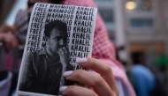 (Files) A pro-Palestinian demonstrator holds a 